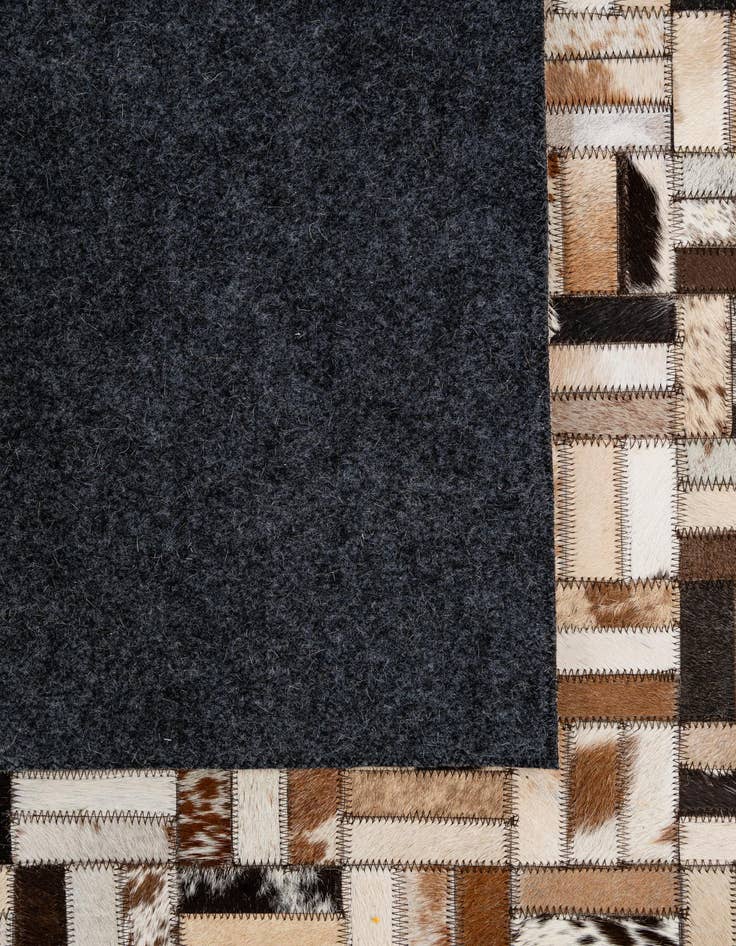 Detail image of  5' x 7' 11 Cowhide - Patchwork Rug
