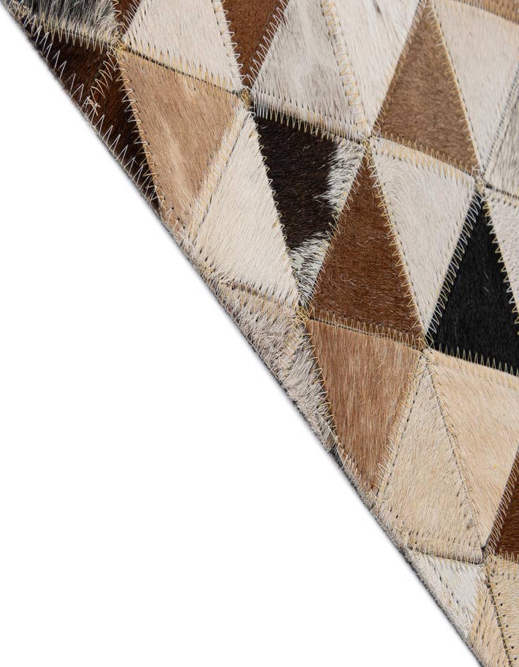 Detail image of  5' x 7' 11 Cowhide - Patchwork Rug
