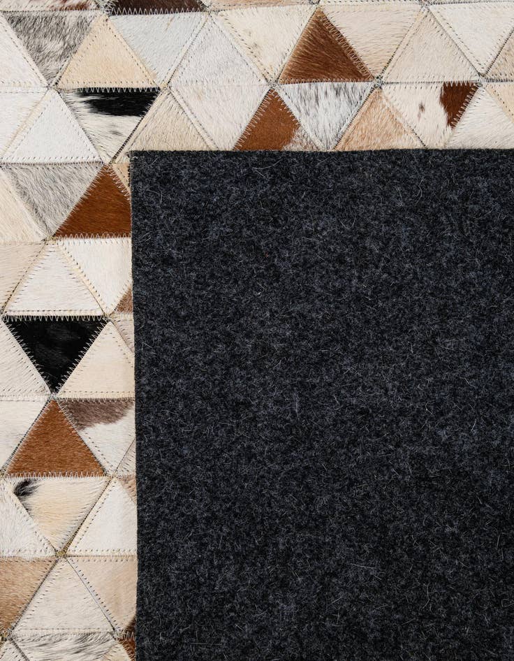 Detail image of  5' x 7' 11 Cowhide - Patchwork Rug