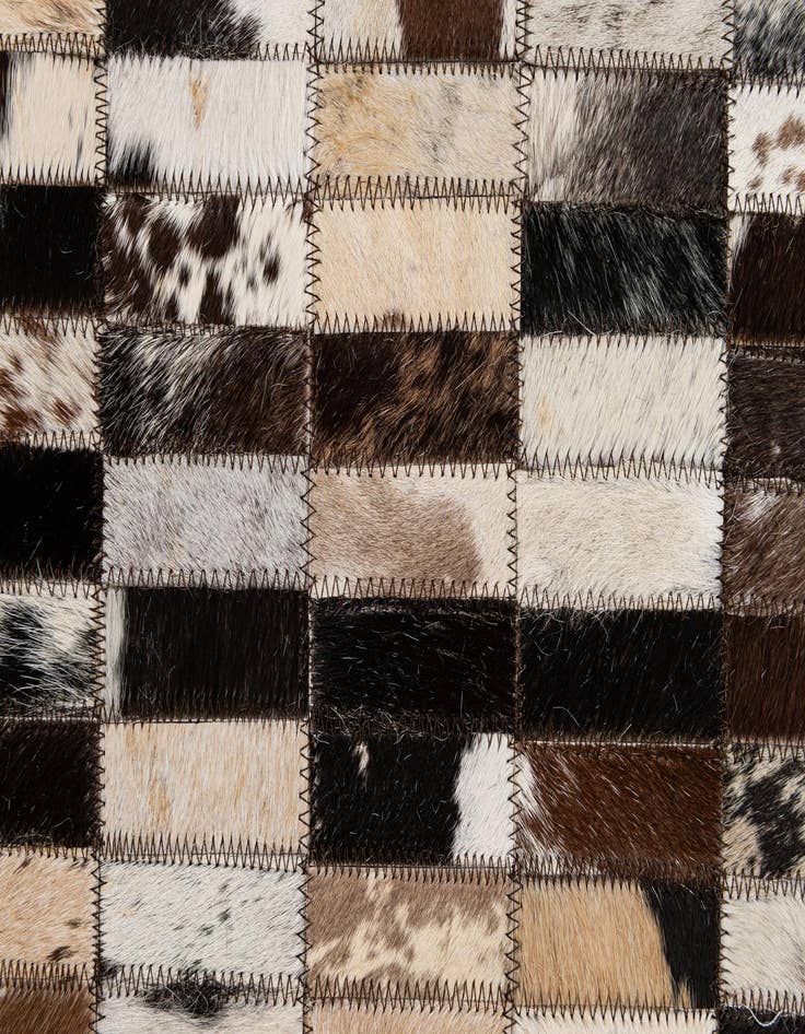 Detail image of  5' 3 x 8' Cowhide - Patchwork Rug