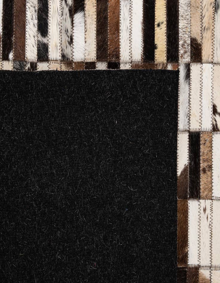 Detail image of  5' 3 x 8' Cowhide - Patchwork Rug