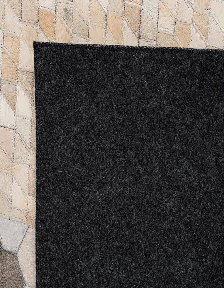 Detail image of  5' 2 x 8' 1 Cowhide - Patchwork Rug