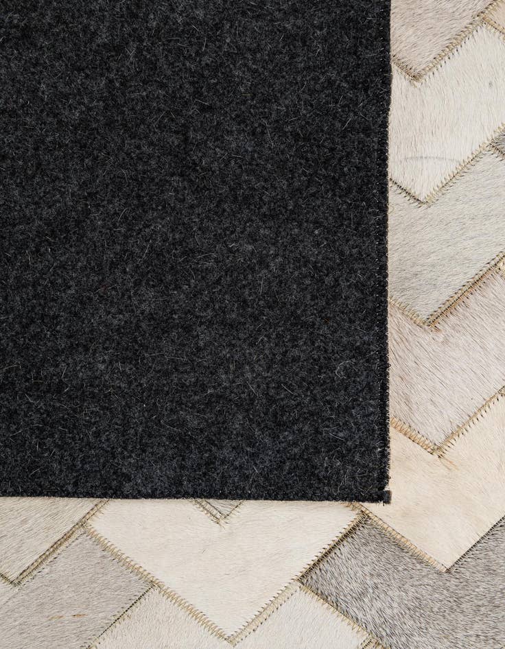 Detail image of  5' 2 x 7' 11 Cowhide - Patchwork Rug