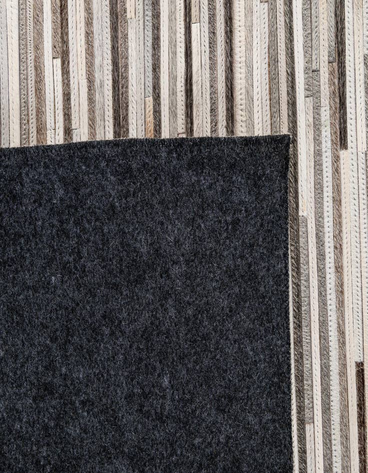 Detail image of  5' 2 x 8' Cowhide - Patchwork Rug