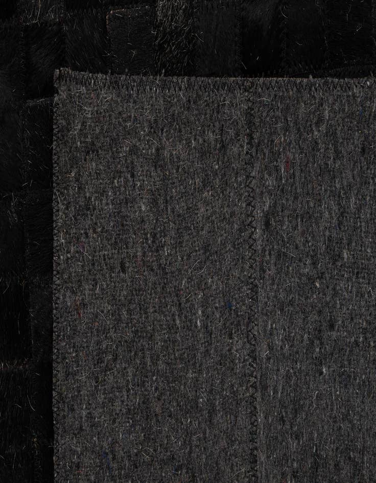 Detail image of  5' x 7' 11 Cowhide - Patchwork Rug