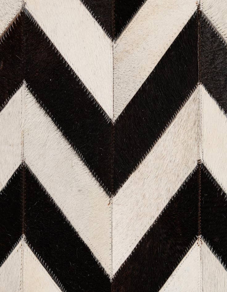 Detail image of  5' 1 x 7' 11 Cowhide - Patchwork Rug