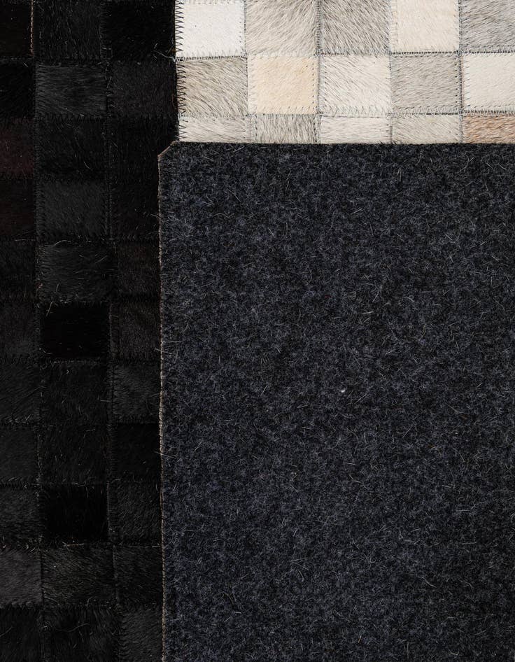 Detail image of  5' 1 x 8' 1 Cowhide - Patchwork Rug