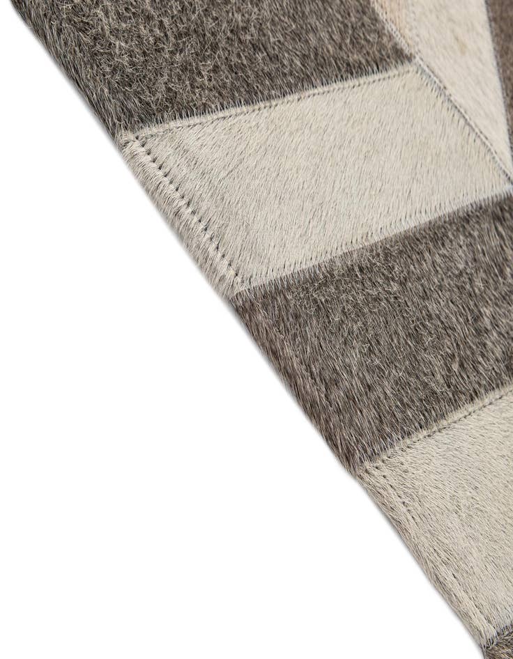 Detail image of  5' 1 x 8' 1 Cowhide - Patchwork Rug