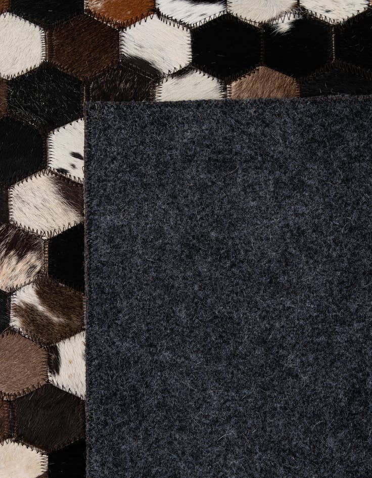 Detail image of  5' 1 x 7' 11 Cowhide - Patchwork Rug
