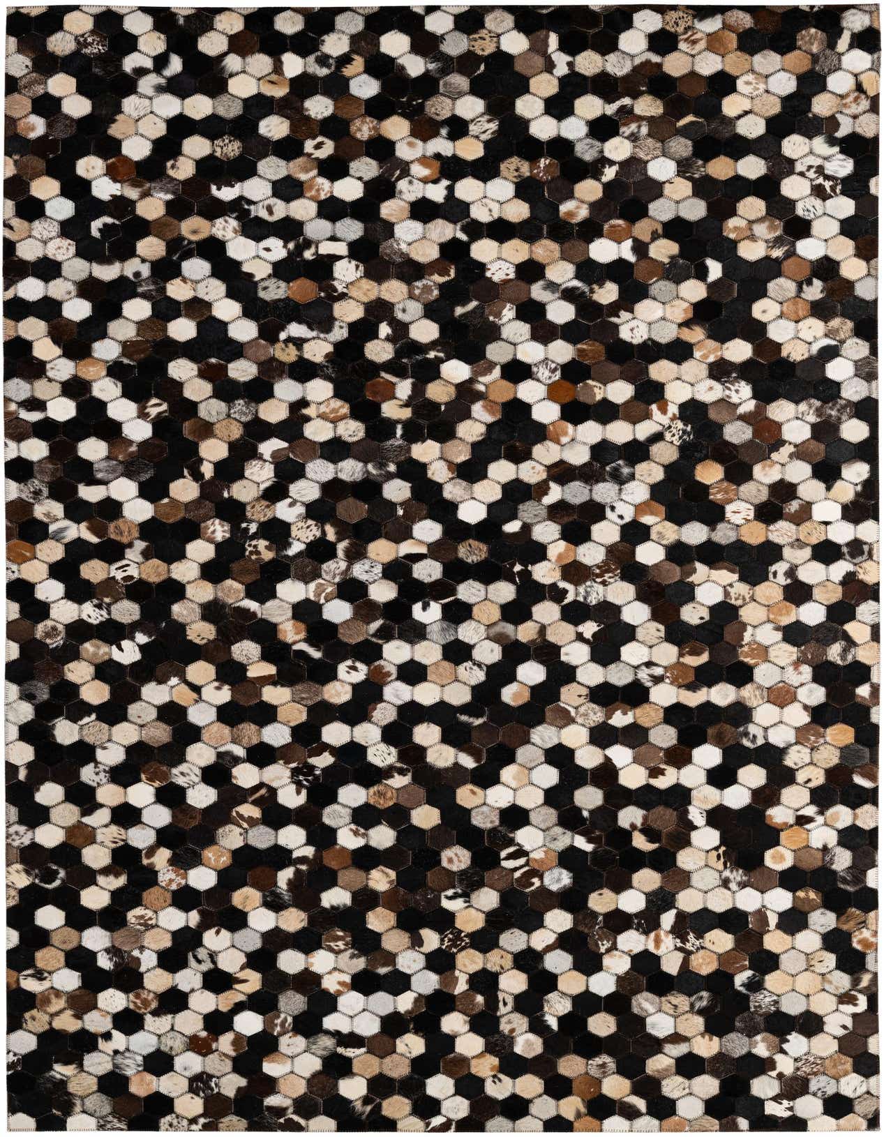 A 5x8 rectangular Cowhide Patchwork rug featuring a modern hexagonal pattern in multi-colored natural cowhide and black leather.