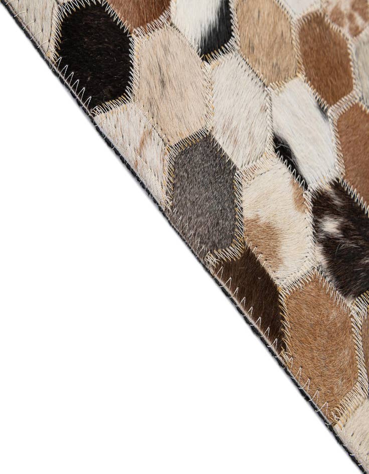 Detail image of  5' 1 x 7' 11 Cowhide - Patchwork Rug
