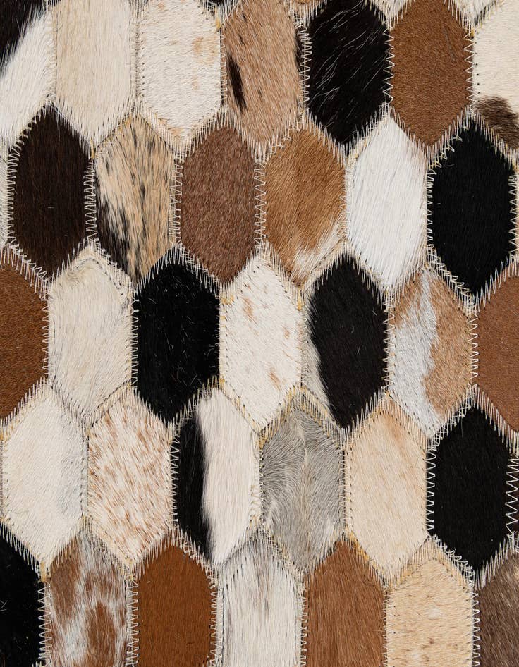 Detail image of  5' 1 x 7' 11 Cowhide - Patchwork Rug