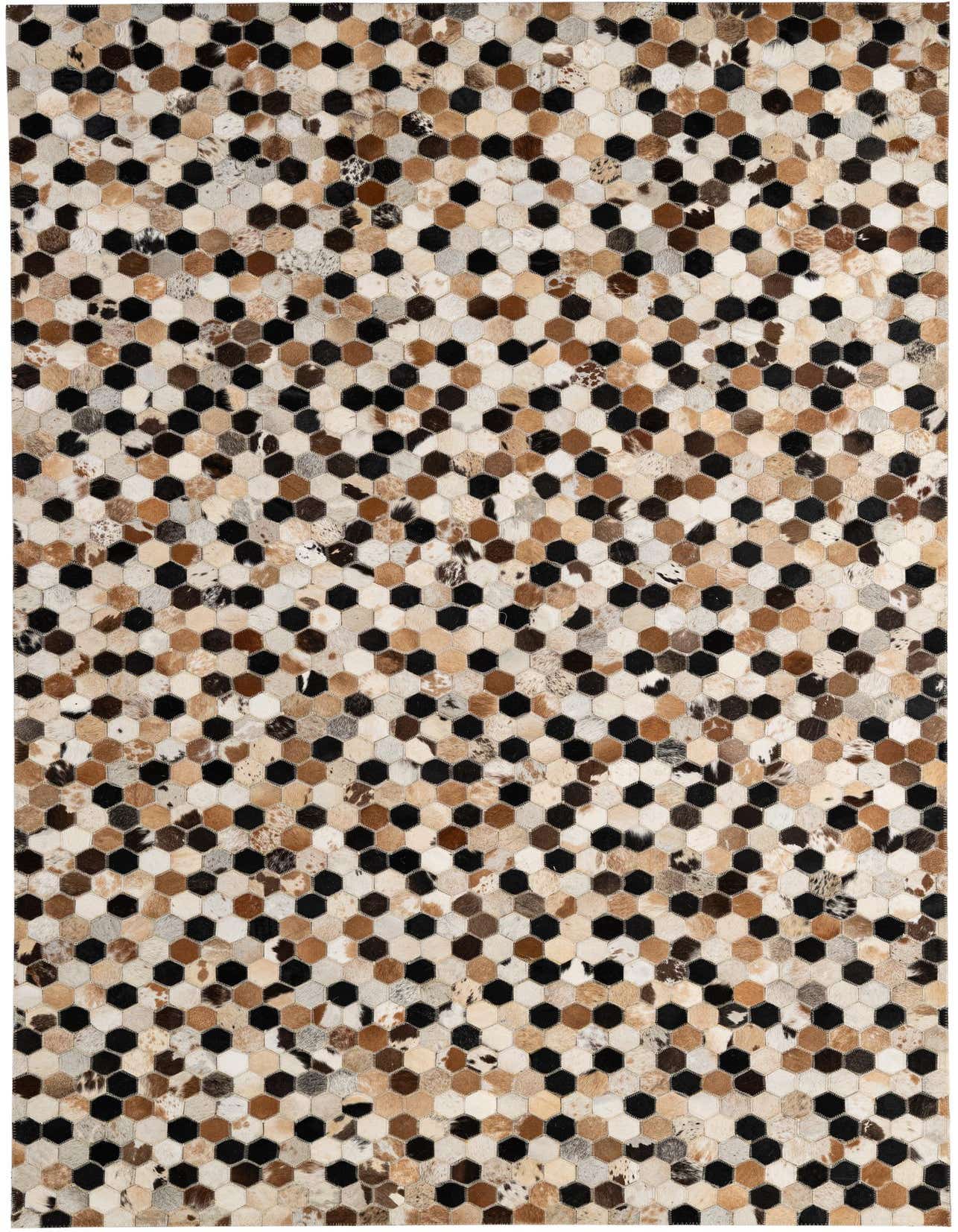 A 5x8 rectangular Cowhide Patchwork rug featuring a modern hexagonal pattern in multi-colored natural cowhide and black leather.