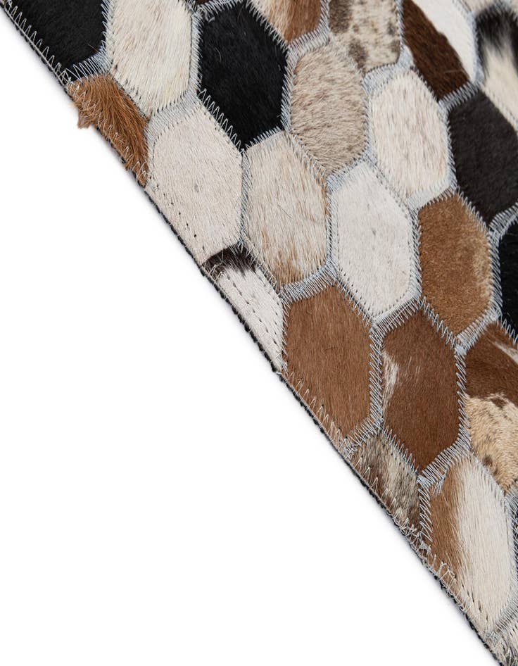 Detail image of  5' 1 x 8' Cowhide - Patchwork Rug