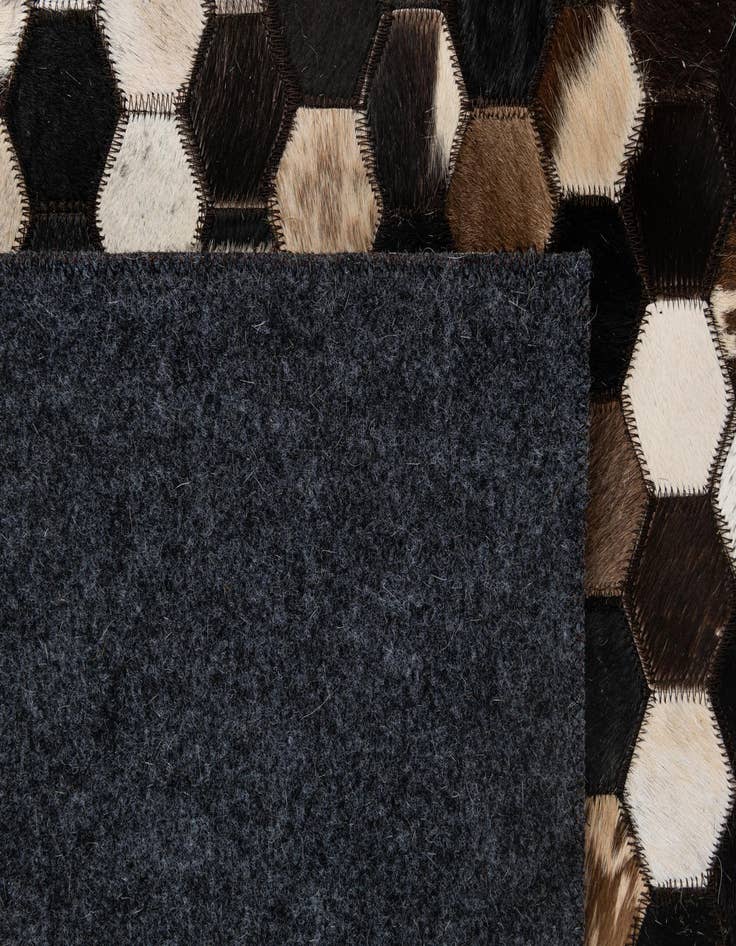 Detail image of  5' 1 x 8' Cowhide - Patchwork Rug