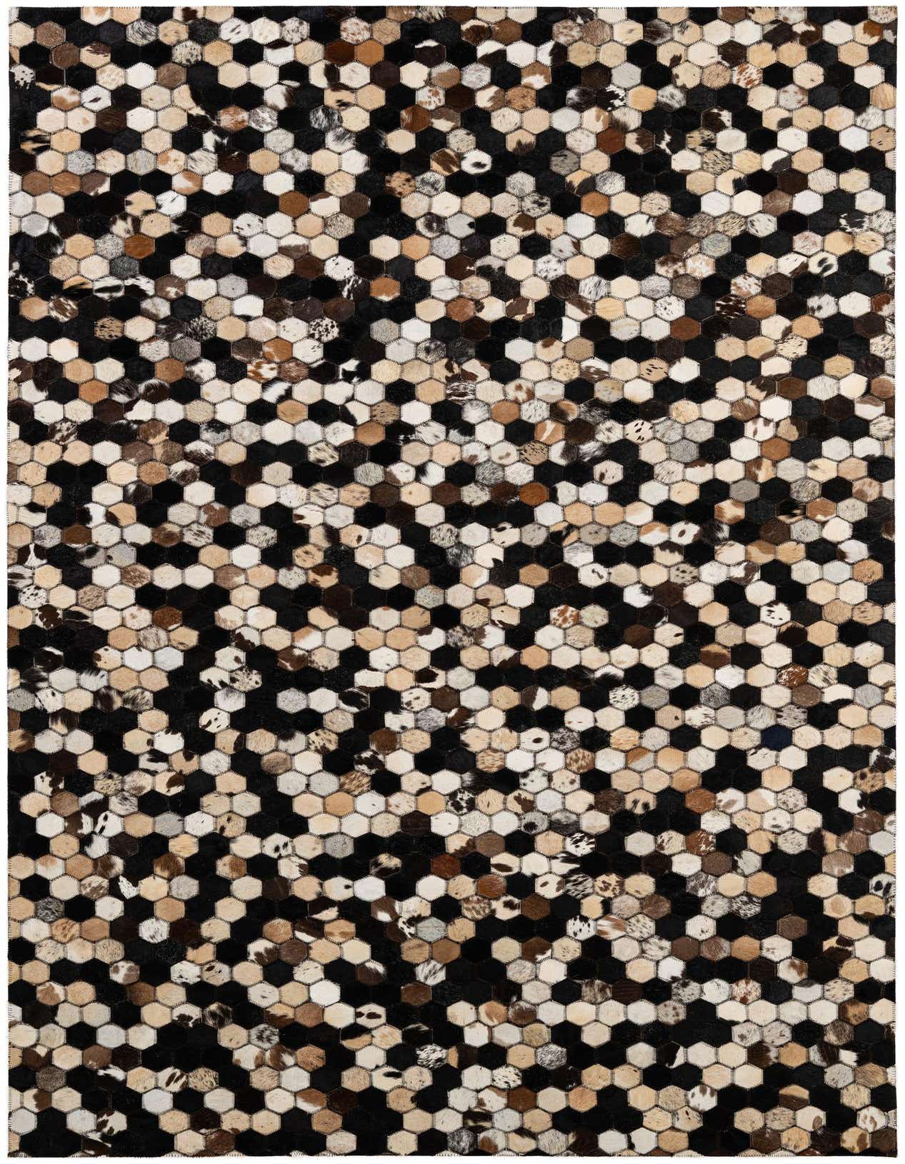 A 5x8 rectangular Cowhide Patchwork rug featuring a modern geometric pattern of multi-colored hexagonal cowhide and leather patches.