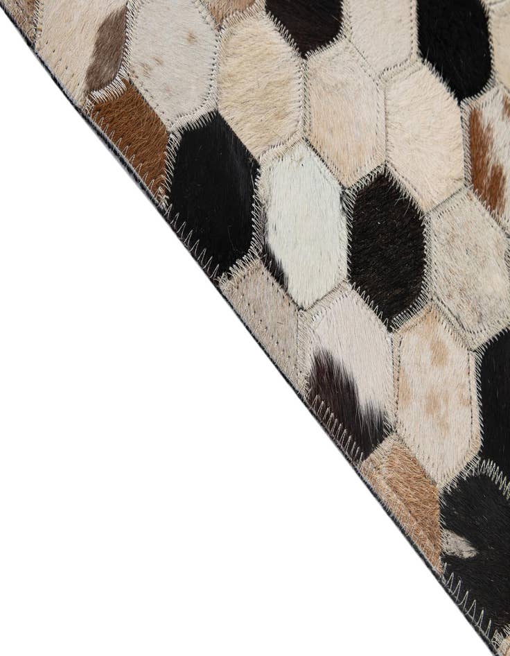 Detail image of  5' x 7' 11 Cowhide - Patchwork Rug