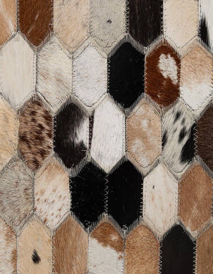Detail image of  5' x 7' 11 Cowhide - Patchwork Rug