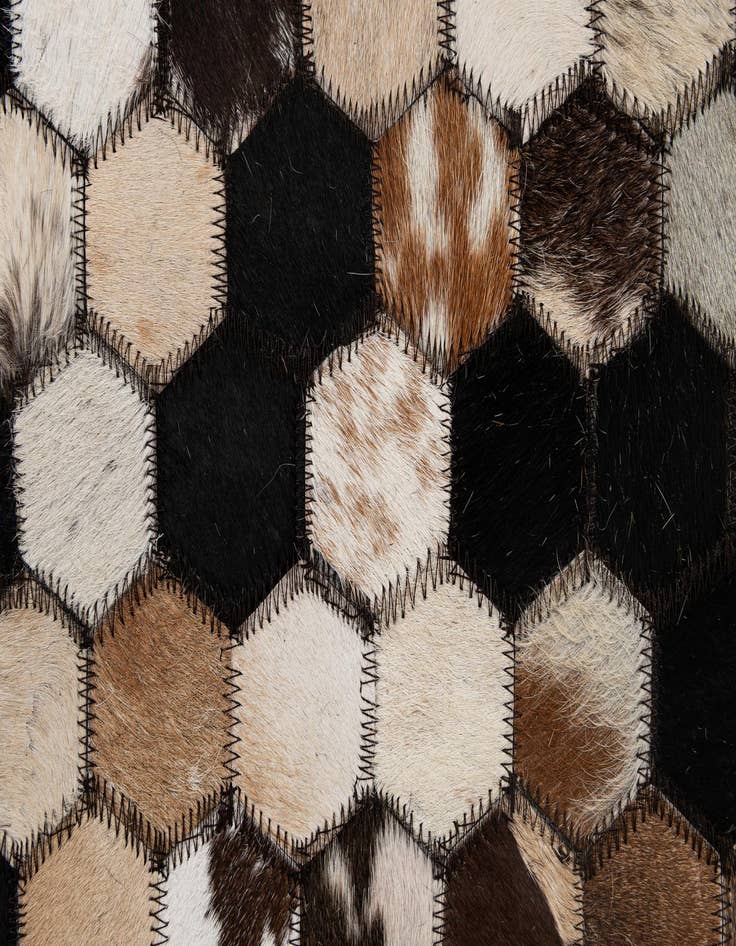 Detail image of  5' 1 x 8' 1 Cowhide - Patchwork Rug