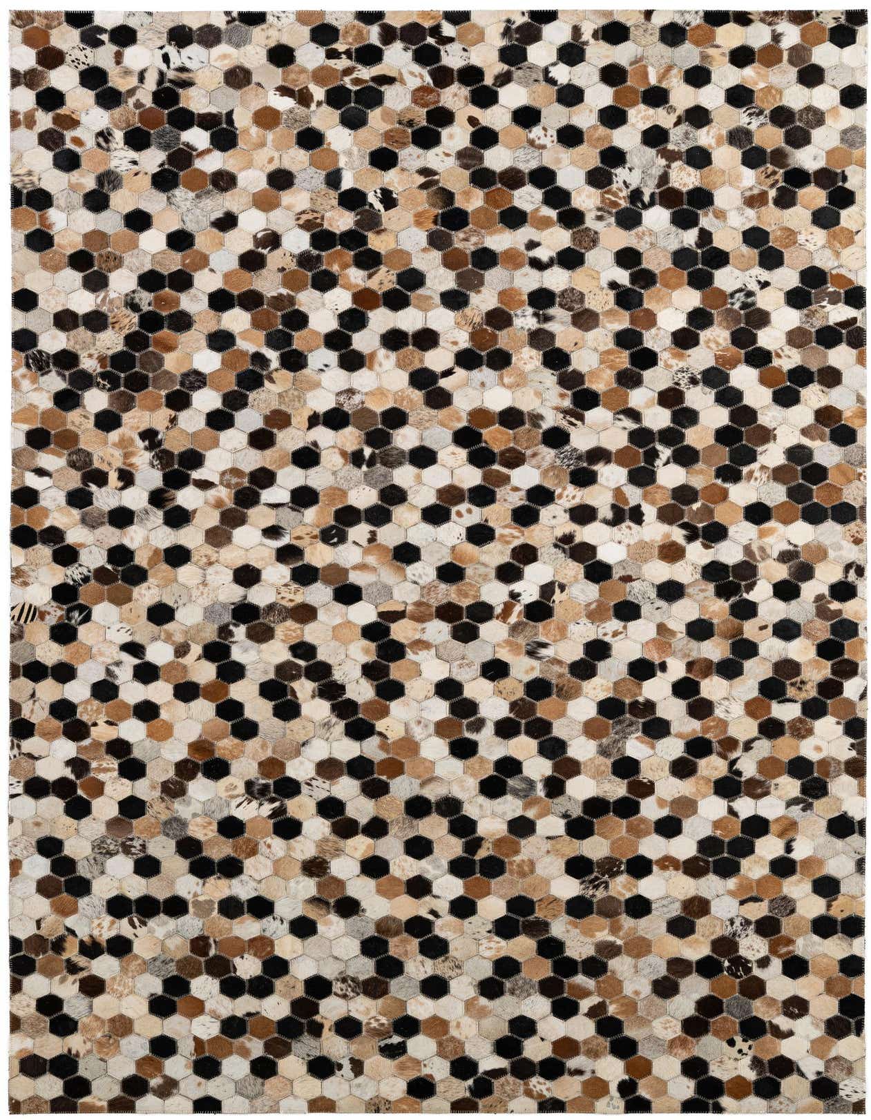 A 5x8 rectangular Cowhide Patchwork rug featuring a modern hexagonal pattern in multi-colored natural cowhide and black.