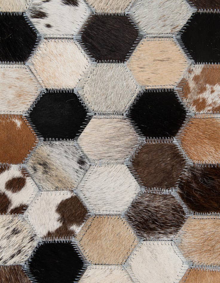 Detail image of  5' 1 x 7' 11 Cowhide - Patchwork Rug