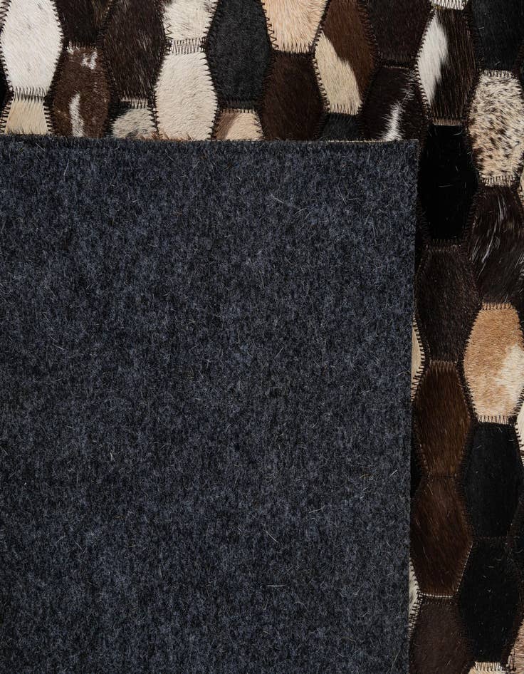 Detail image of  5' 1 x 8' Cowhide - Patchwork Rug
