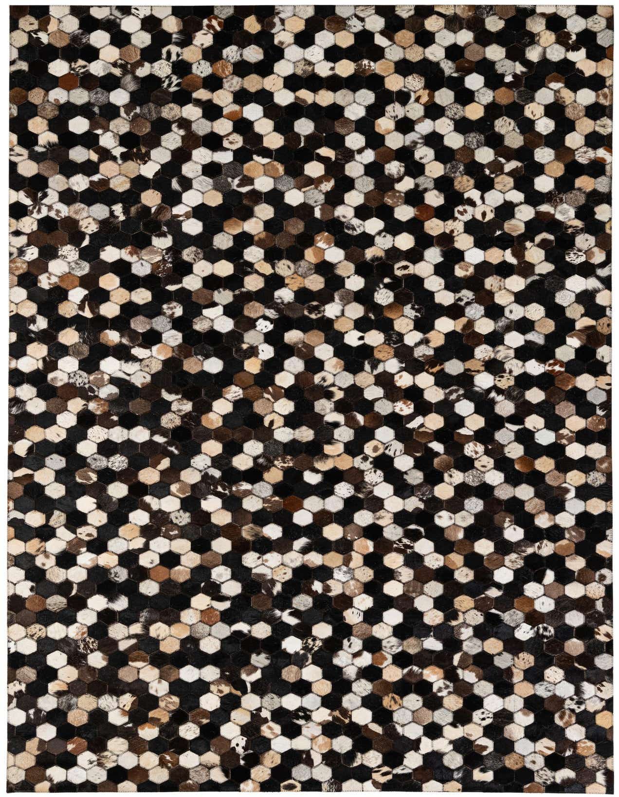 A 5x8 rectangular Cowhide Patchwork rug featuring a modern geometric pattern of multi-colored hexagonal leather and cowhide pieces in shades of black, brown, and cream.