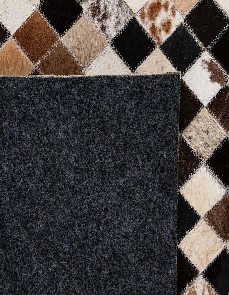 Detail image of  5' 1 x 8' Cowhide - Patchwork Rug