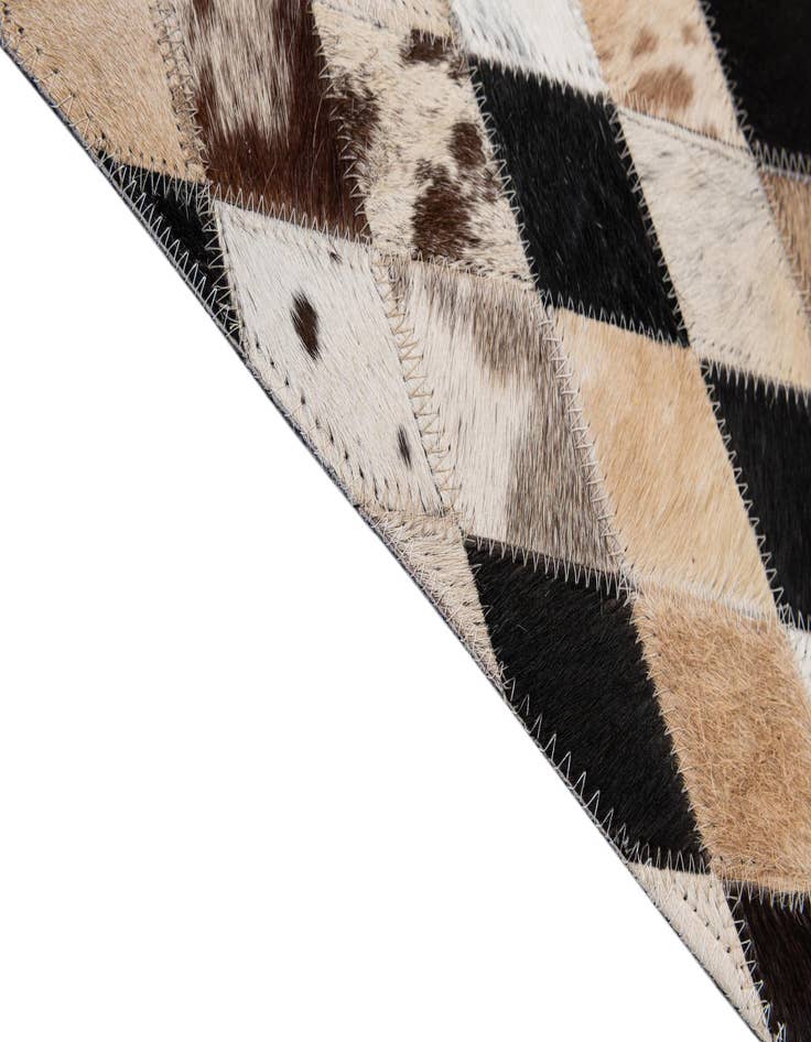 Detail image of  5' x 7' 11 Cowhide - Patchwork Rug