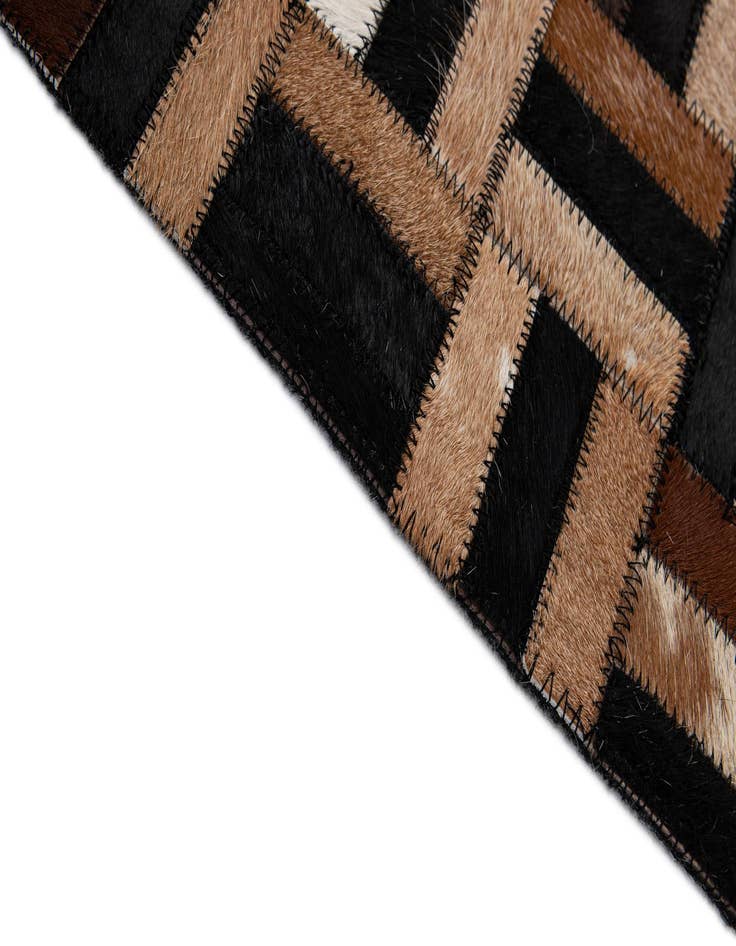 Detail image of  4' 11 x 8' Cowhide - Patchwork Rug