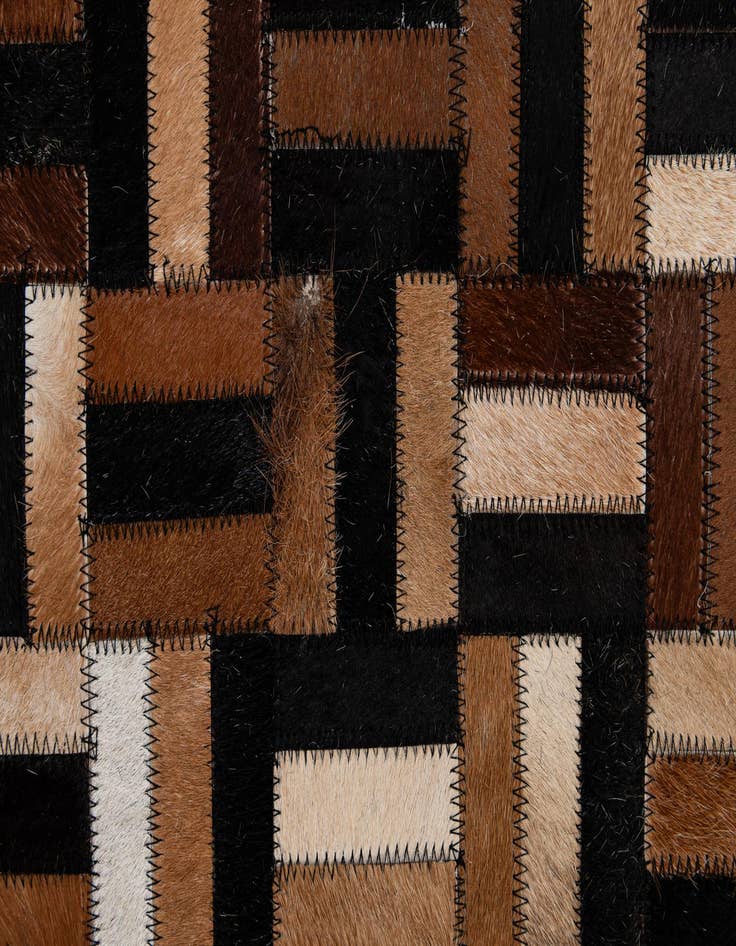 Detail image of  4' 11 x 8' Cowhide - Patchwork Rug