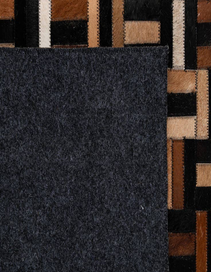 Detail image of  4' 11 x 8' Cowhide - Patchwork Rug