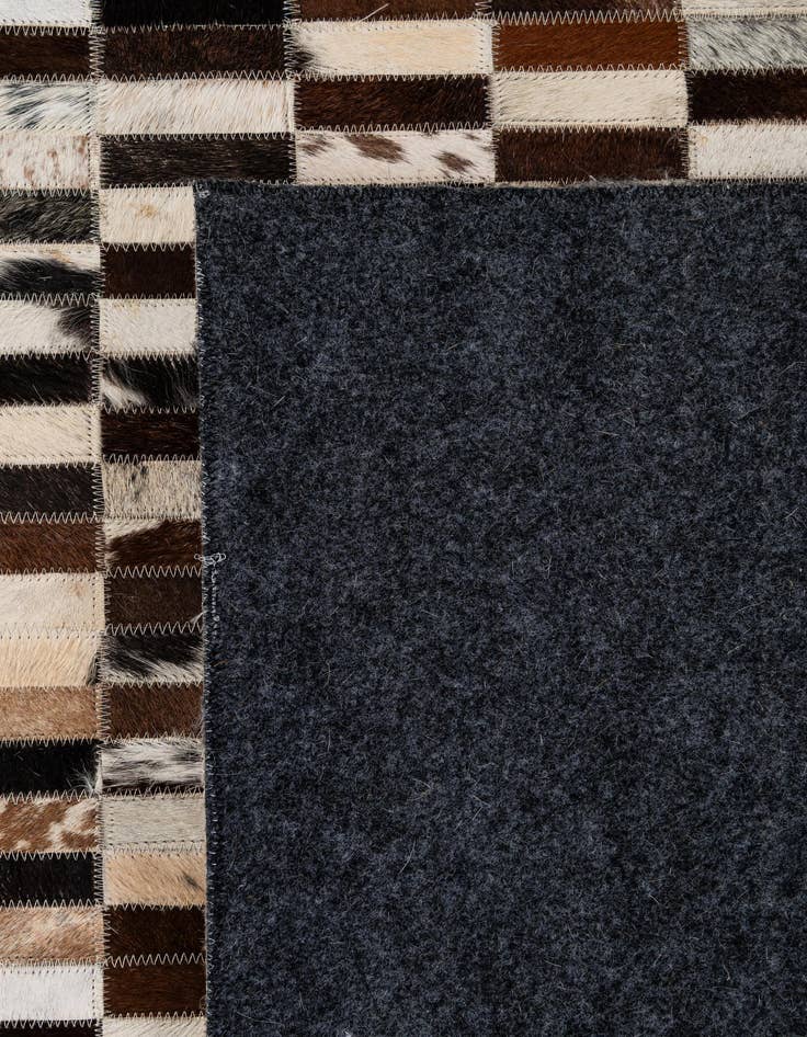 Detail image of  4' 11 x 7' 11 Cowhide - Patchwork Rug