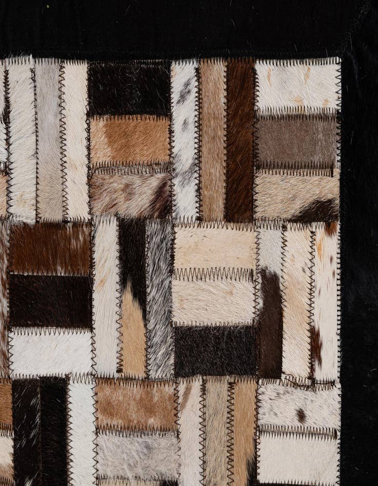 Detail image of  5' 2 x 7' 11 Cowhide - Patchwork Rug