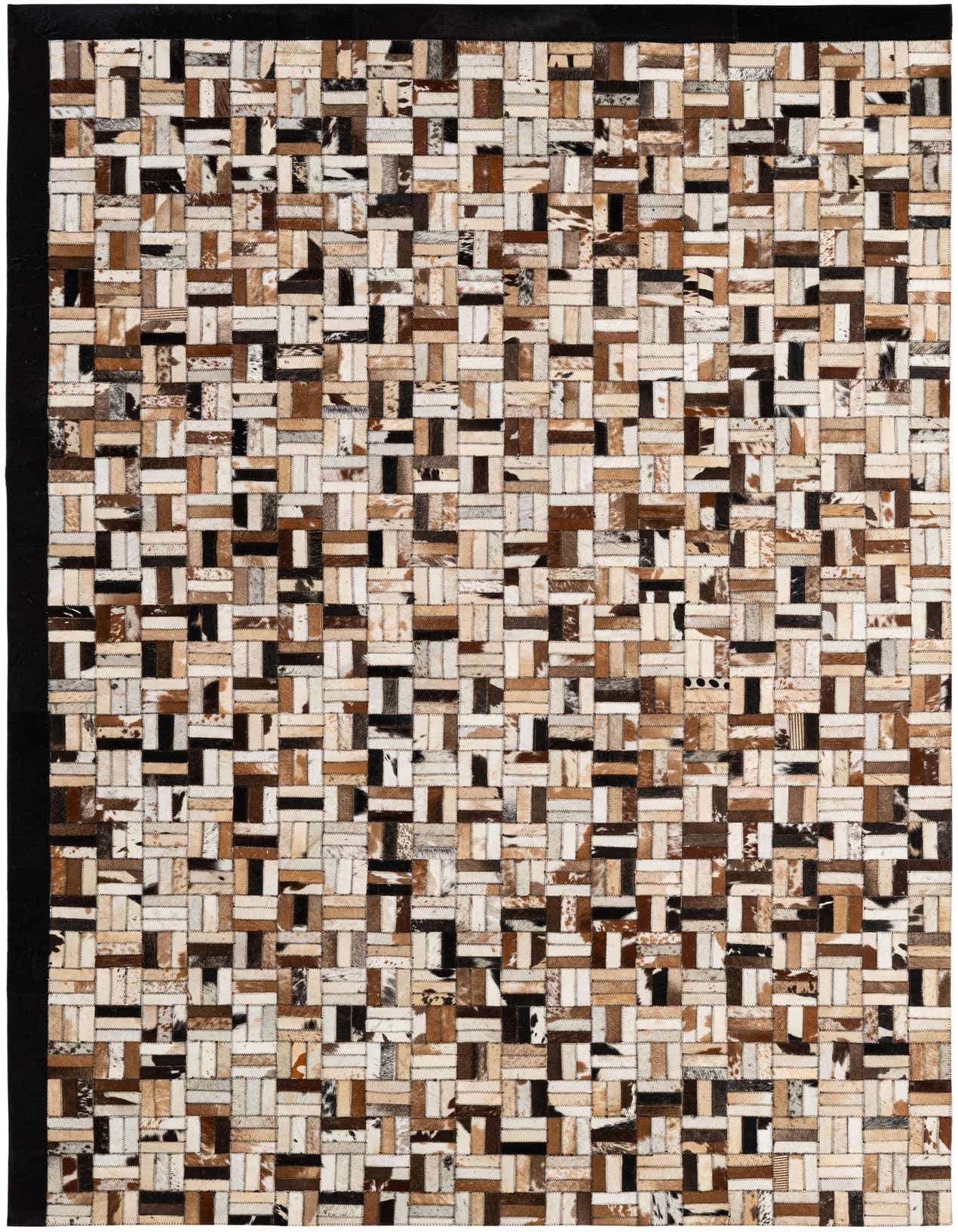 A 5x8 rectangular Cowhide Patchwork rug featuring a modern stripe pattern in multi-colored natural cowhide and leather.