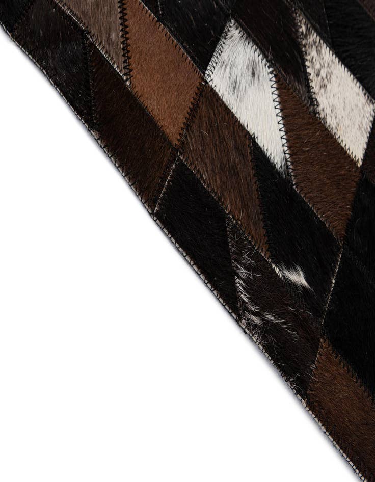 Detail image of  5' 1 x 7' 10 Cowhide - Patchwork Rug