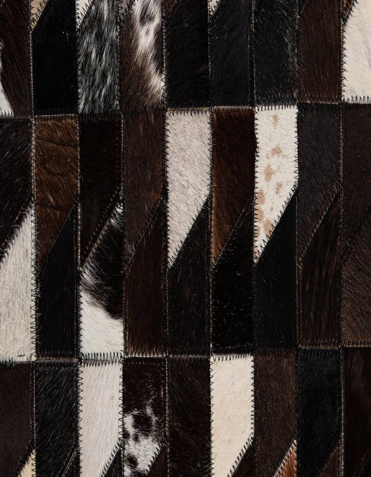 Detail image of  5' 1 x 7' 10 Cowhide - Patchwork Rug