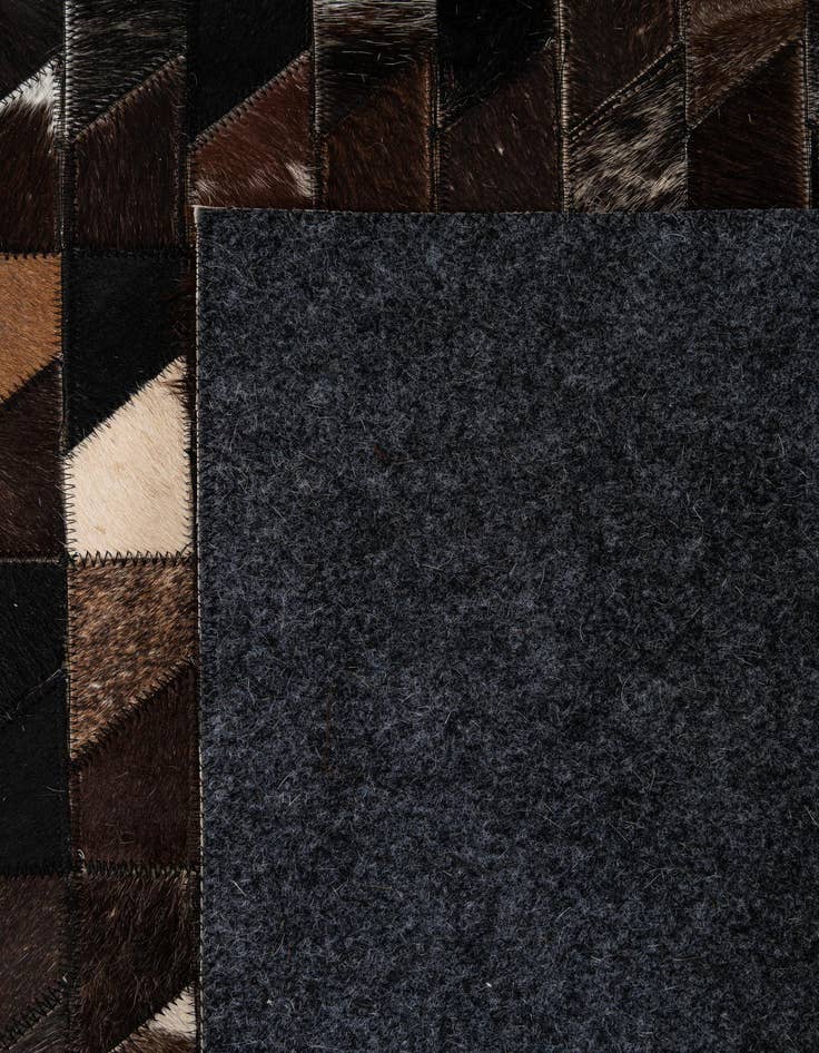 Detail image of  5' 1 x 7' 10 Cowhide - Patchwork Rug