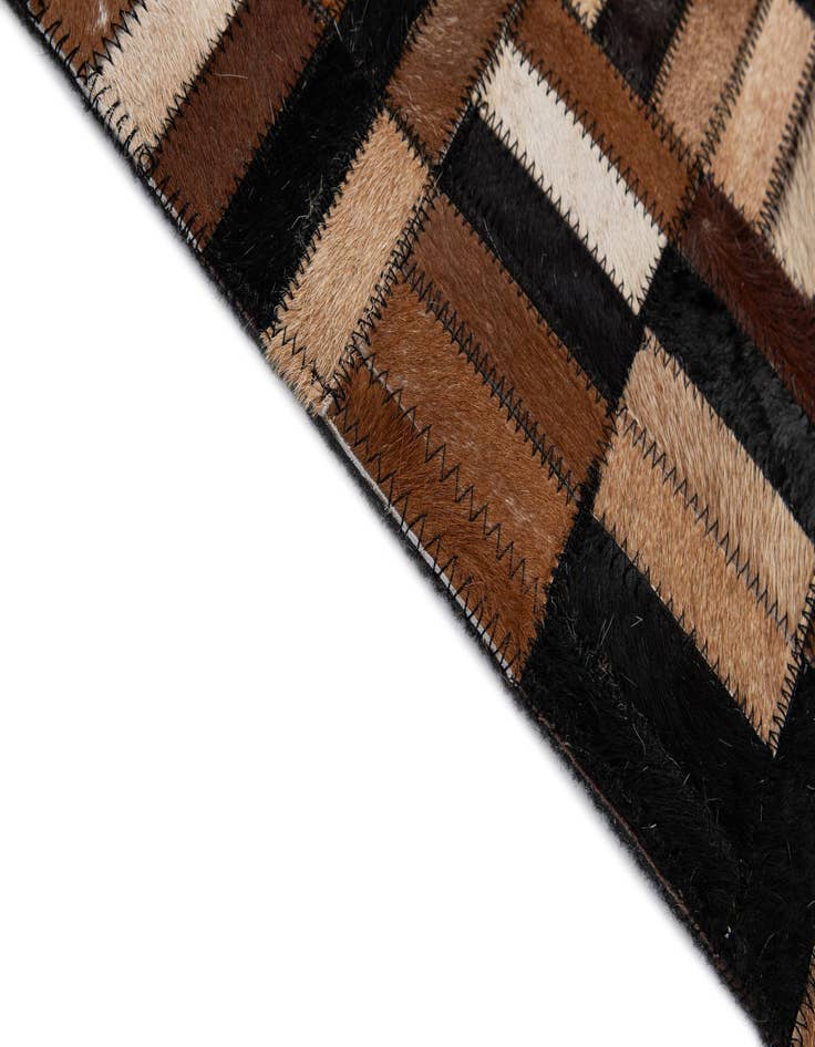 Detail image of  4' 11 x 7' 9 Cowhide - Patchwork Rug