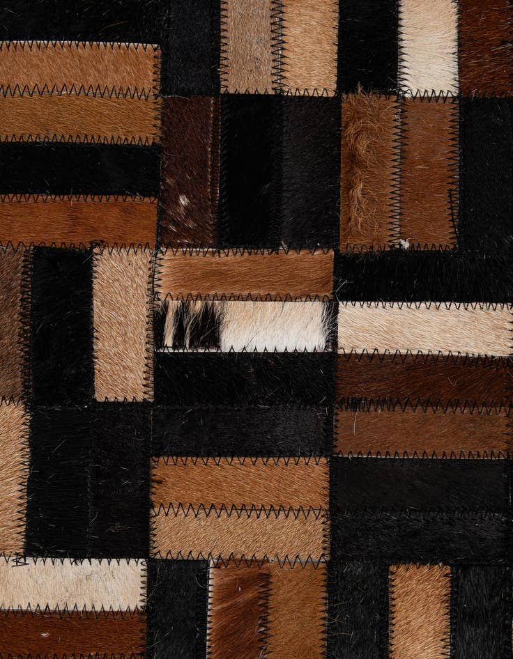 Detail image of  4' 11 x 7' 9 Cowhide - Patchwork Rug