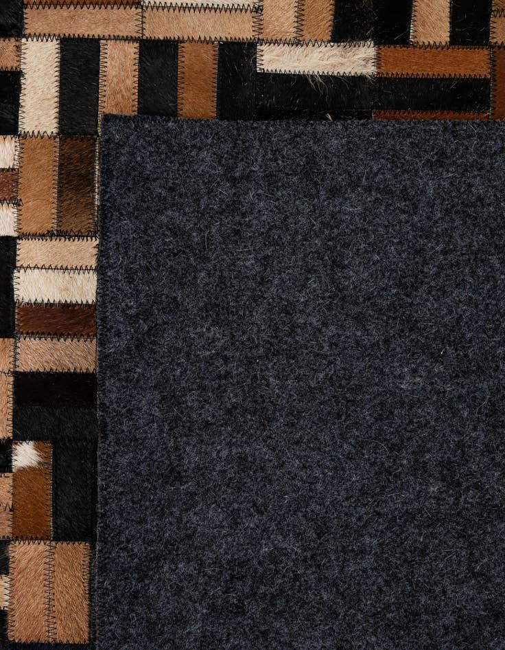 Detail image of  4' 11 x 7' 9 Cowhide - Patchwork Rug