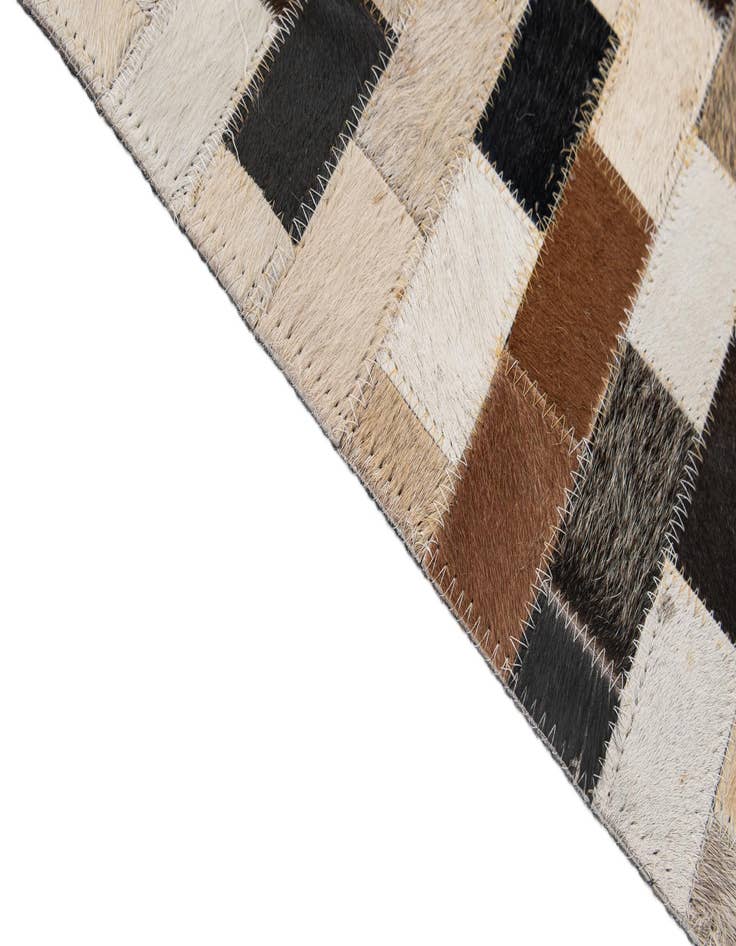Detail image of  5' 1 x 7' 11 Cowhide - Patchwork Rug