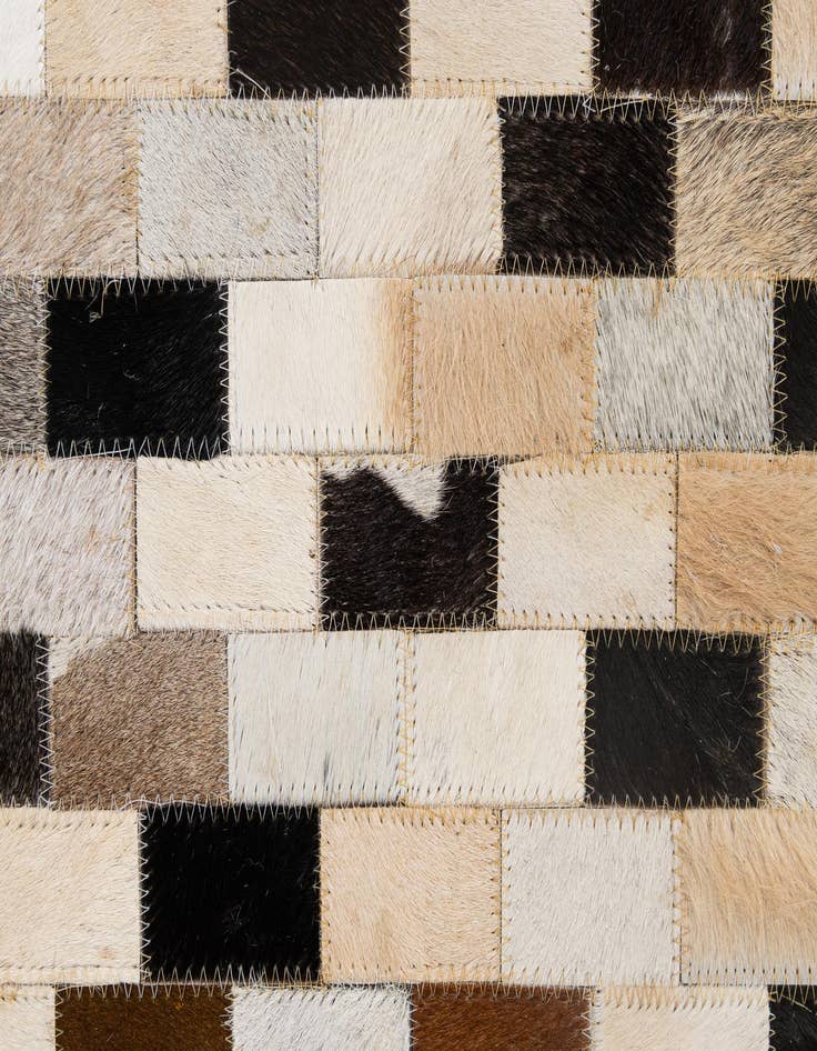 Detail image of  5' 1 x 7' 11 Cowhide - Patchwork Rug