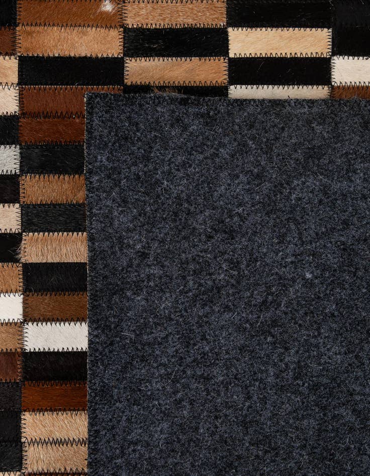 Detail image of  5' 2 x 8' 1 Cowhide - Patchwork Rug