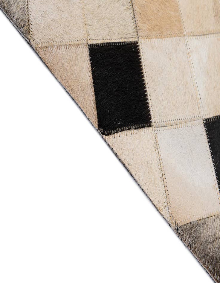 Detail image of  5' 1 x 7' 10 Cowhide - Patchwork Rug