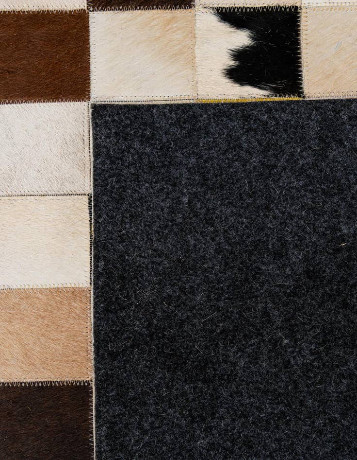 Detail image of  5' 1 x 7' 10 Cowhide - Patchwork Rug