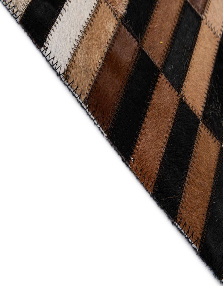 Detail image of  5' x 7' 11 Cowhide - Patchwork Rug