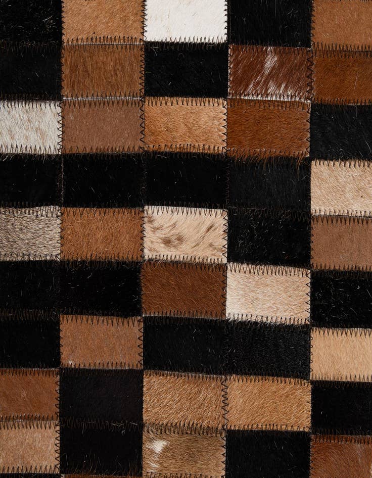 Detail image of  5' x 7' 11 Cowhide - Patchwork Rug