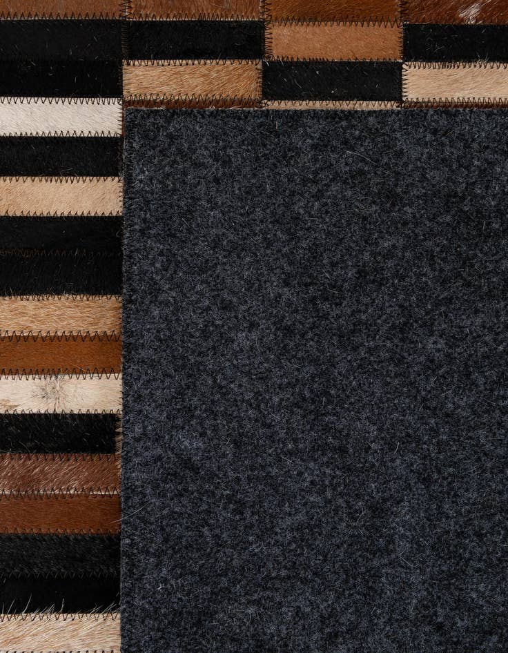 Detail image of  5' x 7' 11 Cowhide - Patchwork Rug