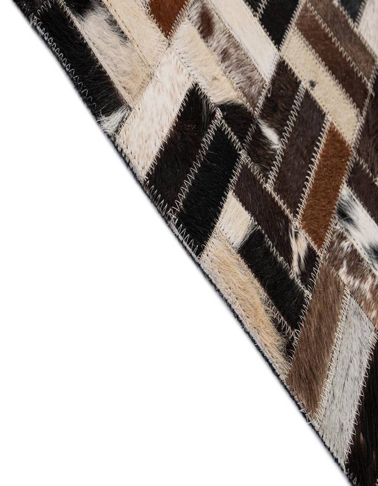 Detail image of  5' x 7' 11 Cowhide - Patchwork Rug